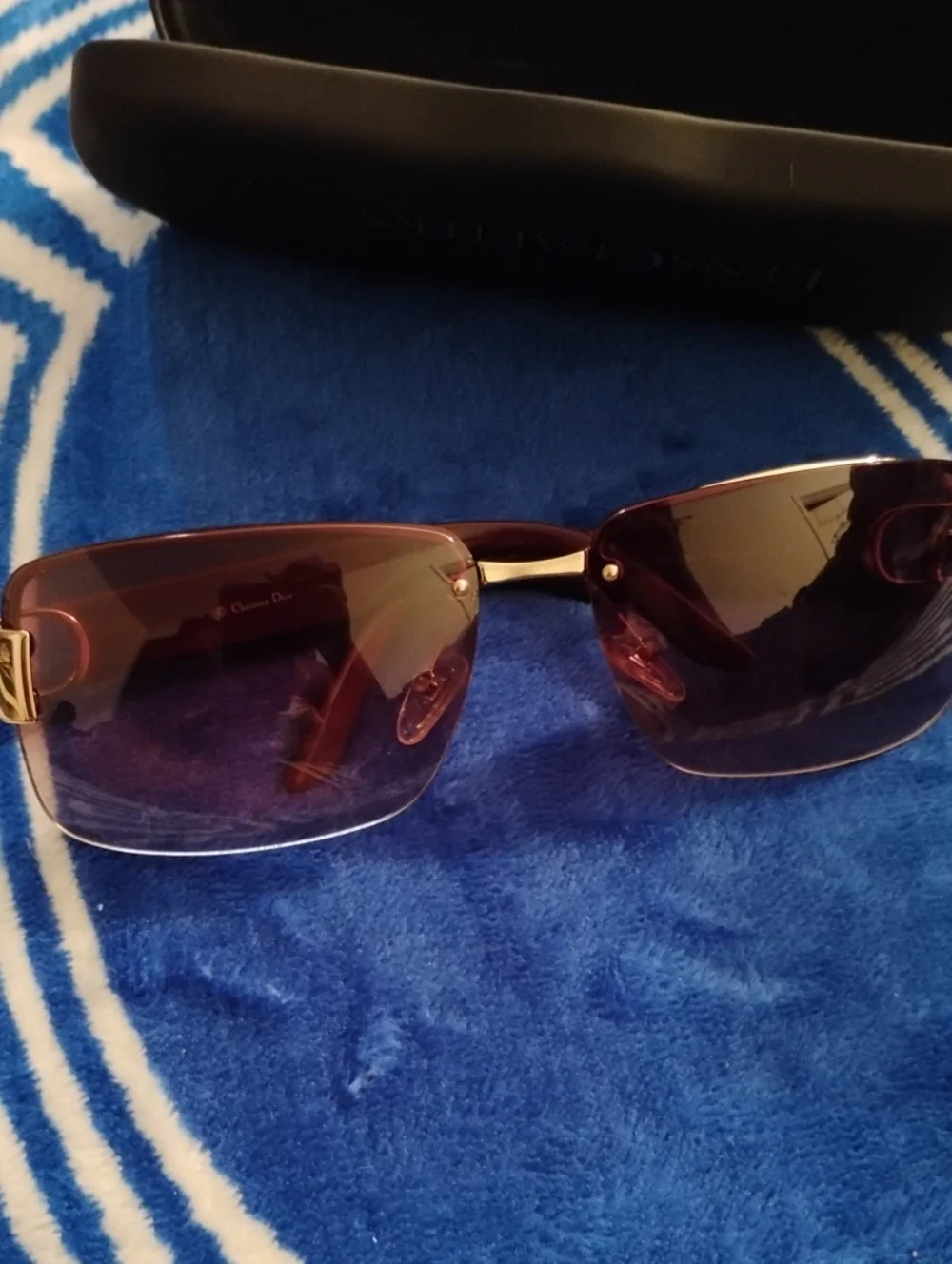 Dior Men’s Rimless Sunglasses — Purple Gradient Lenses with Gold Bridge